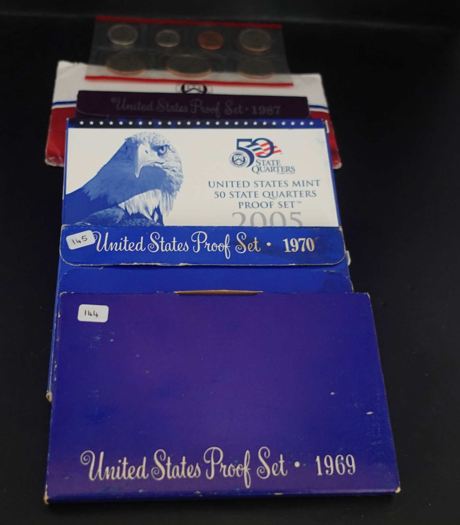 (6) US Mint Sets: This includes the 1969 and 1970 Mint Sets that have the Silver Kennedy Half Dollar.