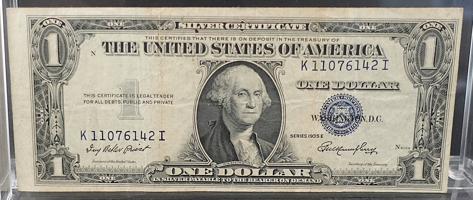 1935-E $1 Silver Certificate: This has a very nice Misaligned Cut! SN 6142