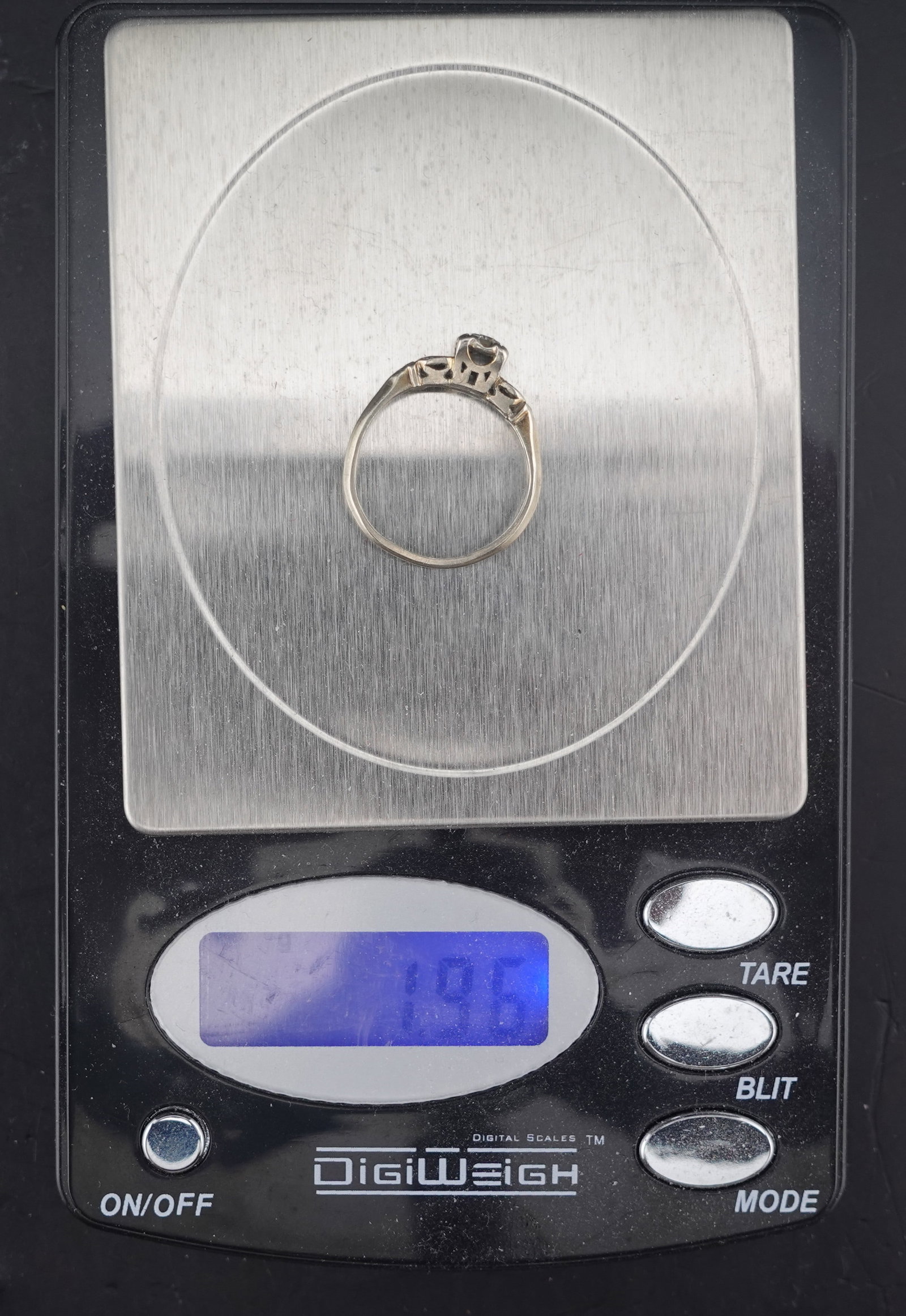 This is a 14k White Gold Wedding Band with 5 diamonds - 3