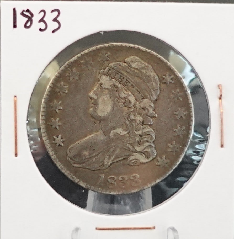 1833 Capped Bust Half Dollar: This looks to be a 35-40 in Grade