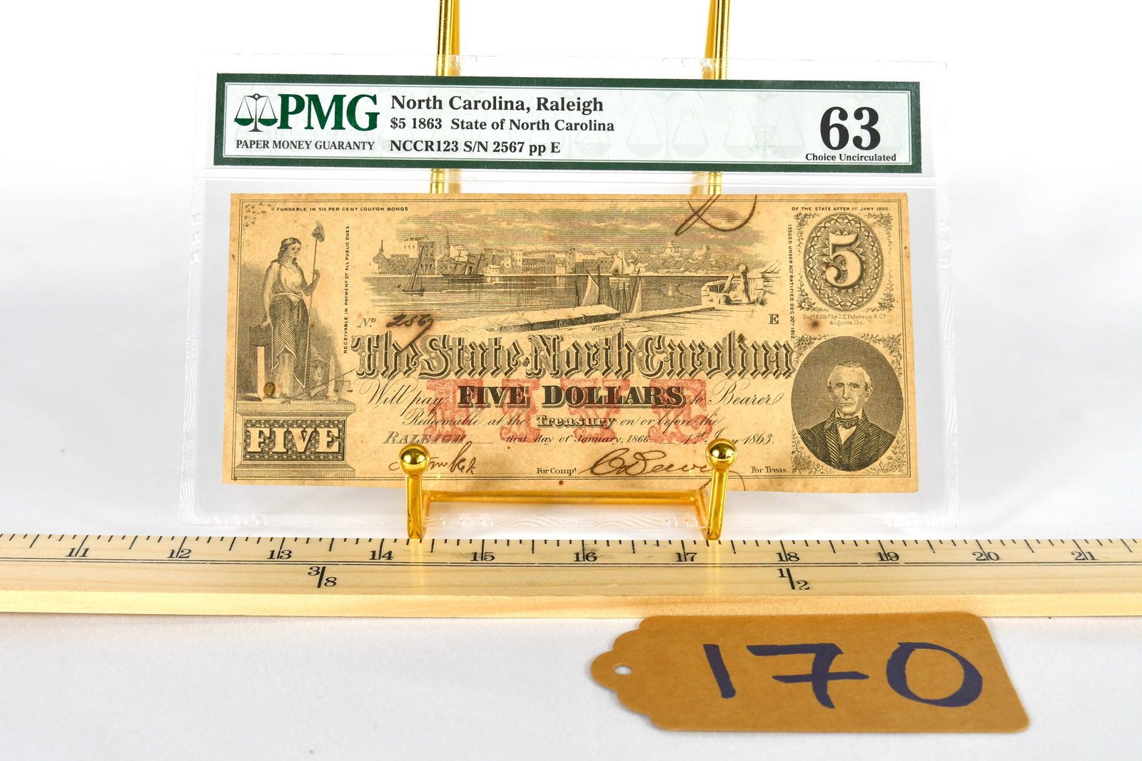 1863 Confederate $5.00 NC Bank Note (Ser. No. 2567 Pp E): Confederate $5.00 Raleigh, NC Bank Note (Ser. No. 2567 pp E) Jan 1st, 1863 - Obsolete Bank Note PMG Certified - Certificate #1724100-059 NCCR123 S/N 2567 ppE Graded Choice Uncirculated - 63 View Onlin