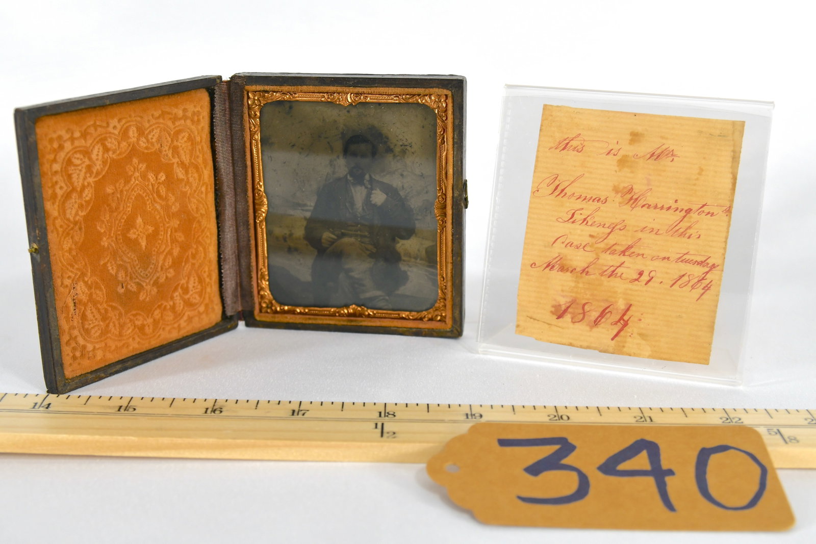 Tintype Of Man With Revolver: Attributed to Thomas Harrington Card reads, "This is Mr. Thomas Harrington's likings in this case taken on Tuesday March the 29th 1864"