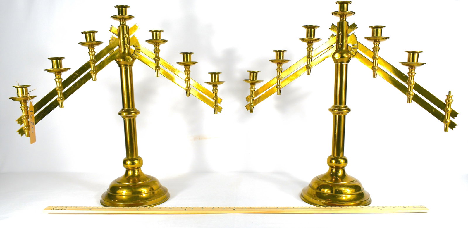 Pair Of Brass Candleabras: Date of 2004 Adjustable with one missing candleholder Mt. Carmel