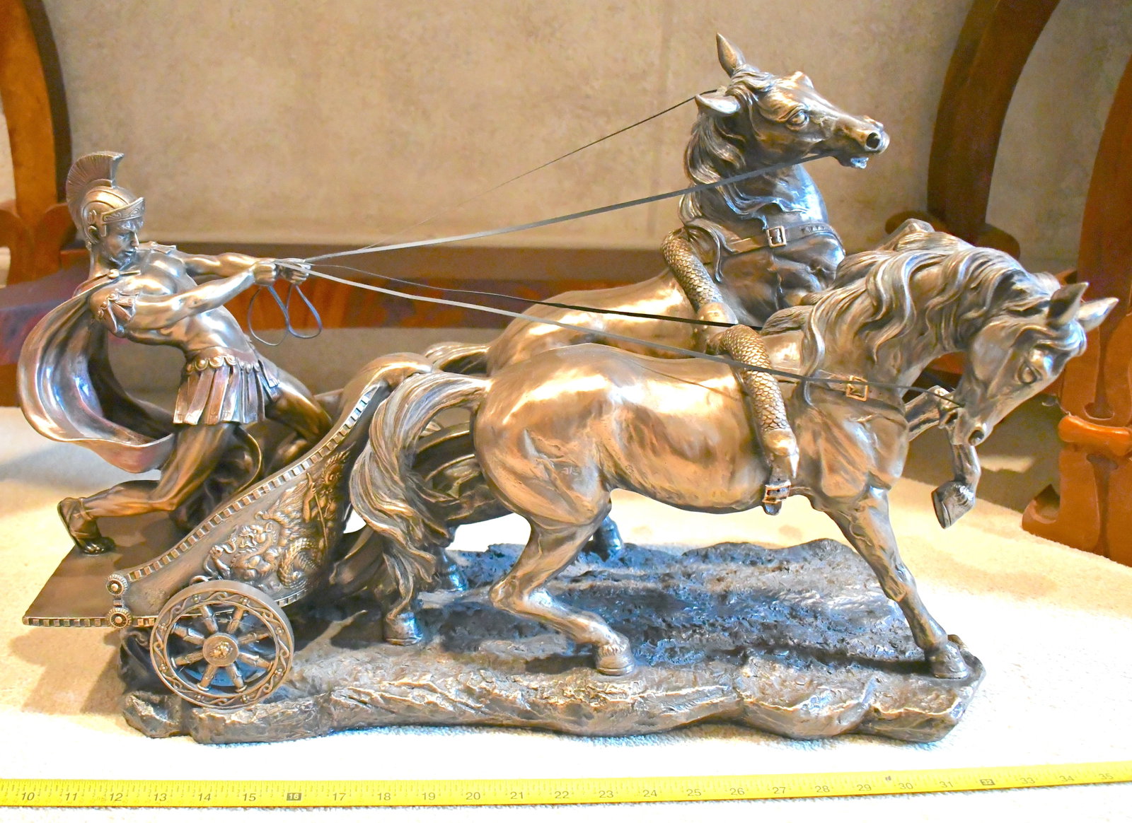 Contemporary Statue "Charge Of The Roman Charioteer": Soldier wrangling two horses while on chariot Bronze in color 23 1/4" wide x 17" tall x 10" deep @2006 Veronese inscription on base