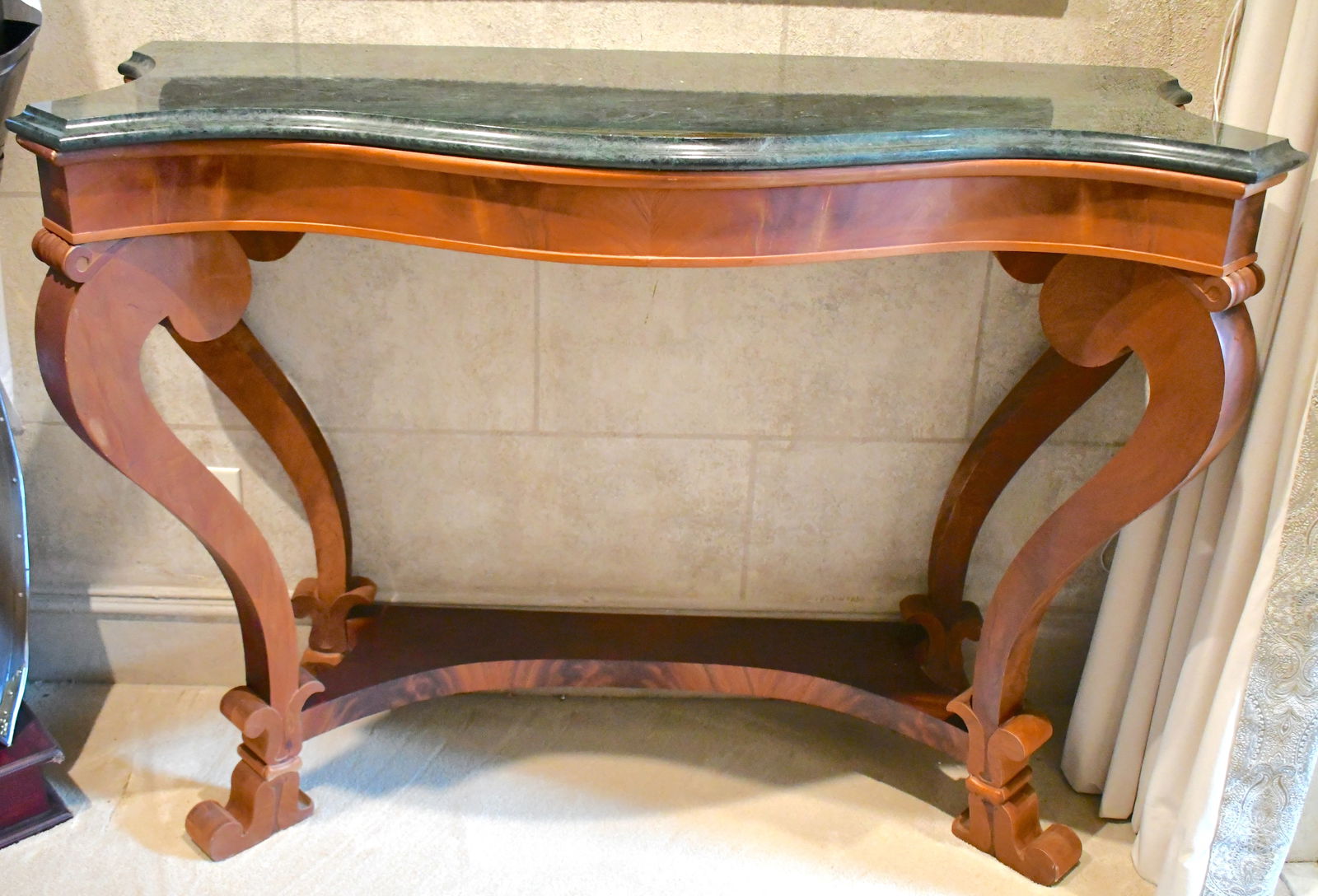 Marble Top Console Table: Has a concave platform base with carved feet and classic lines Green marble top #6453-44M Verde Absoluto MLW S/O# 027156 7/18/02 Henredon Furniture Ind. Handmade in Phillipines