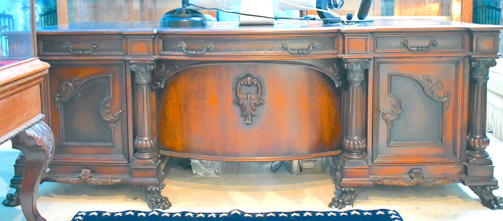 Executive Business Desk: Front side - two drawers with 2 cabinets Left sitting side - one drawer, one cabinet Right sitting side - 3 drawers Center-one curved drawer 39" wide x 30" tall x 82" long Leather topped