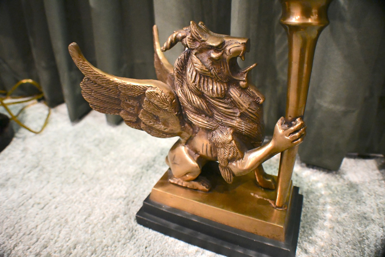 Winged Lion with Horns Statue with Bronze Patina: Winged Lion with Horns statue with glass bowl on top with Bronze patina No markings for manufacturer 17" tall x 12" round bowl