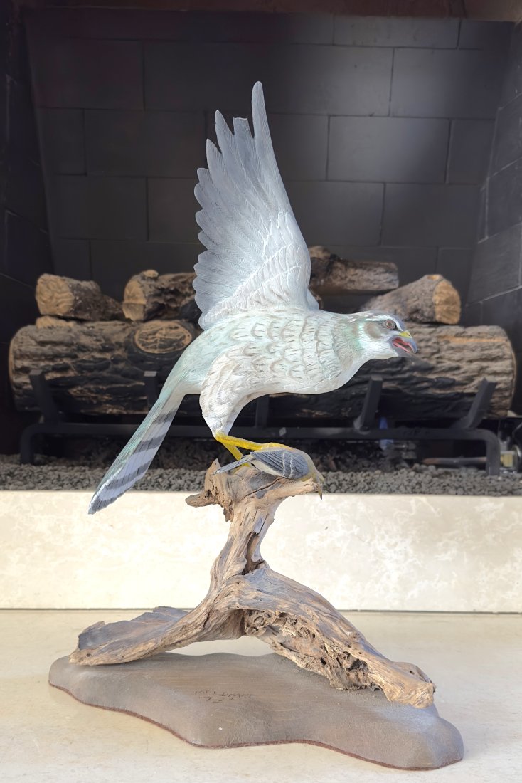 Hand Carved and Painted Bird: Hand Carved and Painted Bird by Mel Drake in 1972 From the Consigner: The piece was carved by one of the Drake Brothers from Florida out of a single piece of wood. The piece was done for the consigner