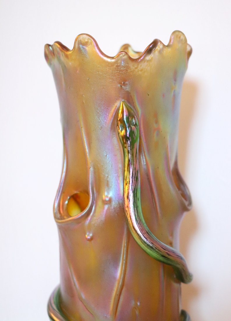 Iridescent Bohemian Gold Glass Vase with Snake Attributed to Loetz: Gorgeous and rare iridescent glass vase with the design of a snake wrapping around a tree. Attributed to Bohemian glassworker Johann Loetz Witwe based on the style and material. No visible signature. 