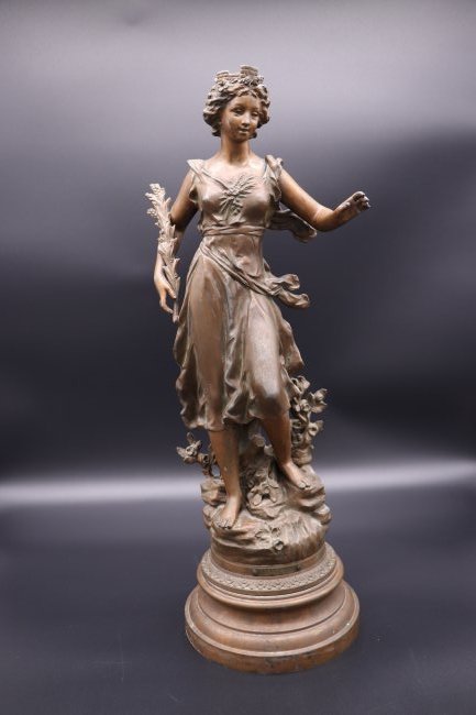 Antique Ernest Rancoulet Spelter Sculpture of Young Woman Titled L'Ile D'Or: Antique Ernest Rancoulet (1870-1915) Spelter Sculpture of young woman wearing a type of crown, Titled L'Ile D'Or. The design appears to symbolize a stone tower built on the small island of L'Ile D'Or 