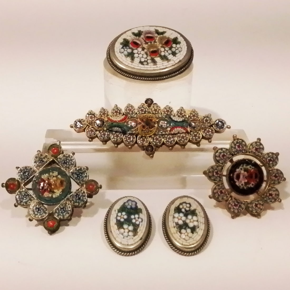 Six Italian Micro Mosaic Brooches: A Group of Six Italian Micro Mosaic Brooches.