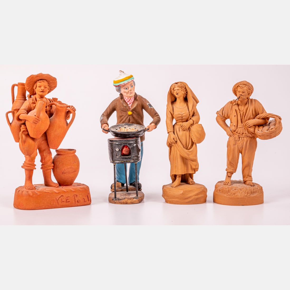 Four Continental Terracotta Figures: Four Continental Terracotta Figures, 20th Century. Tallest dimension: H: 5 1/4 in.