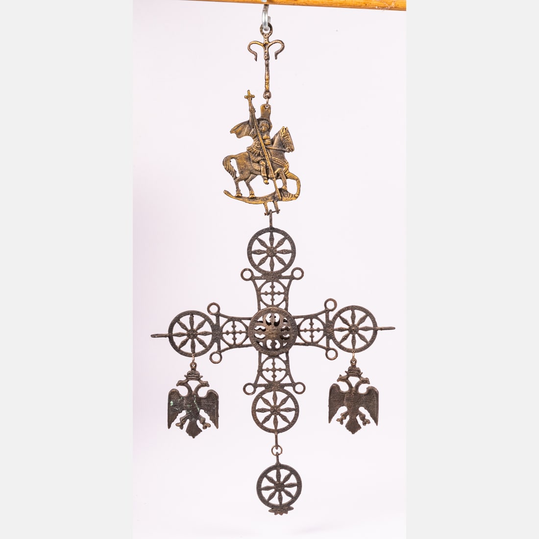 A Cast Brass Byzantine Cross Ornament: A Cast Brass Byzantine Cross Hanging Ornament, 20th Century, Missing candle holders. H: 23 1/2 W: 12 in.