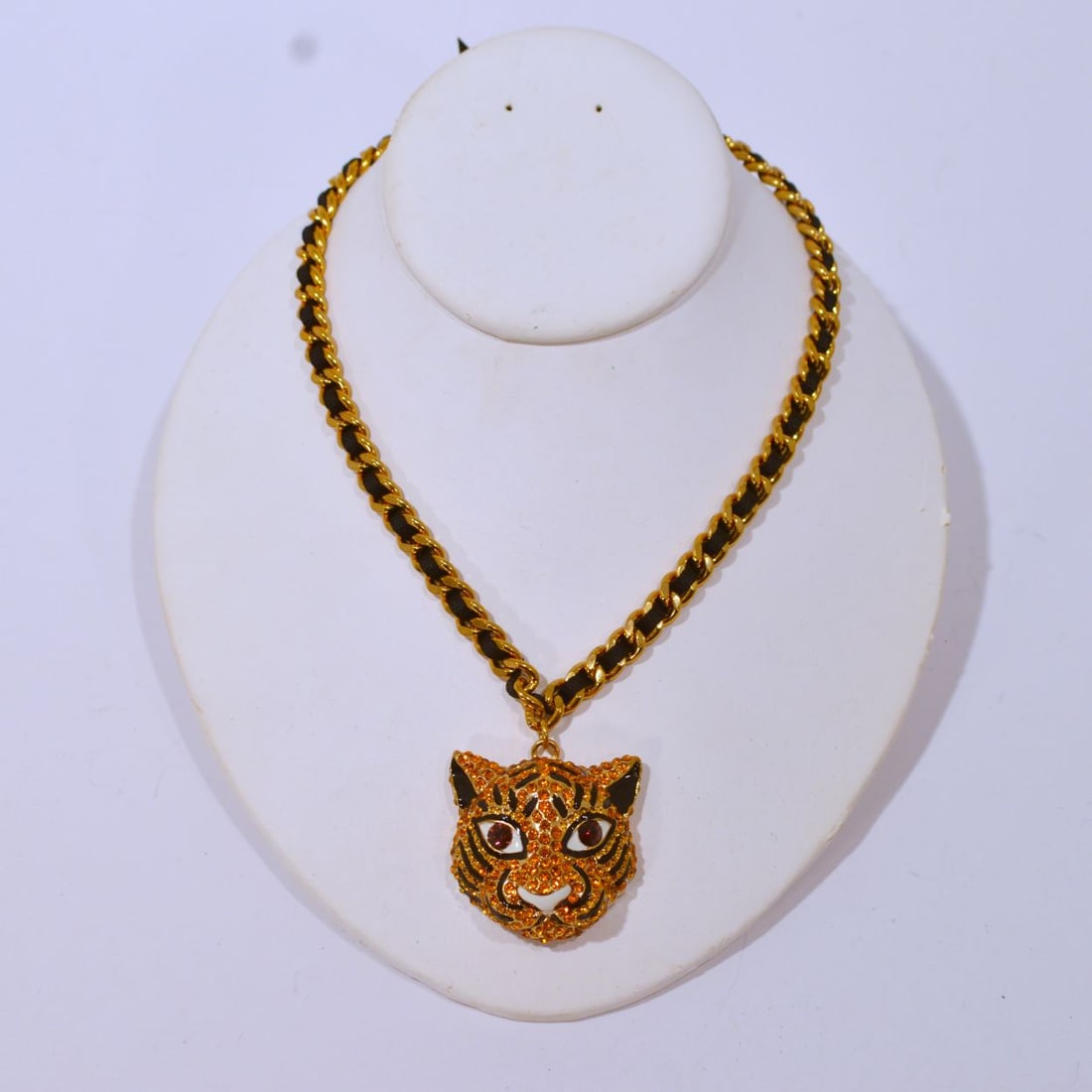 A Betsey Johnson Necklace with Crystal Encrusted Pendant: A Betsey Johnson Necklace with Crystal Encrusted Pendant, Depicting a tiger. From the Asian Jungle Collection. L: 19 1/2 in.