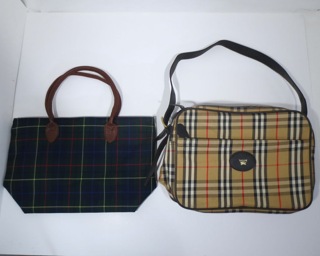 Two Plaid Travel Bags: Two Plaid Travel Bags, One in the style of Burberrys and the other a Pendleton. Largest bag dimensions: H: 11 1/4 x W: 16 1/2 x D: 7 1/4 in.