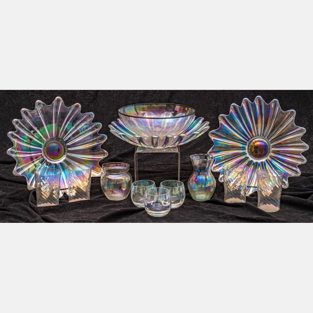 Vintage Federal Glass Celestial Iridescent Bowls together with Other Iridescent Glassware: A Collection of Vintage Federal Glass Celestial Iridescent Bowls, Together with an iridescent glassware and vase. Largest diameter: 11 1/2 in.