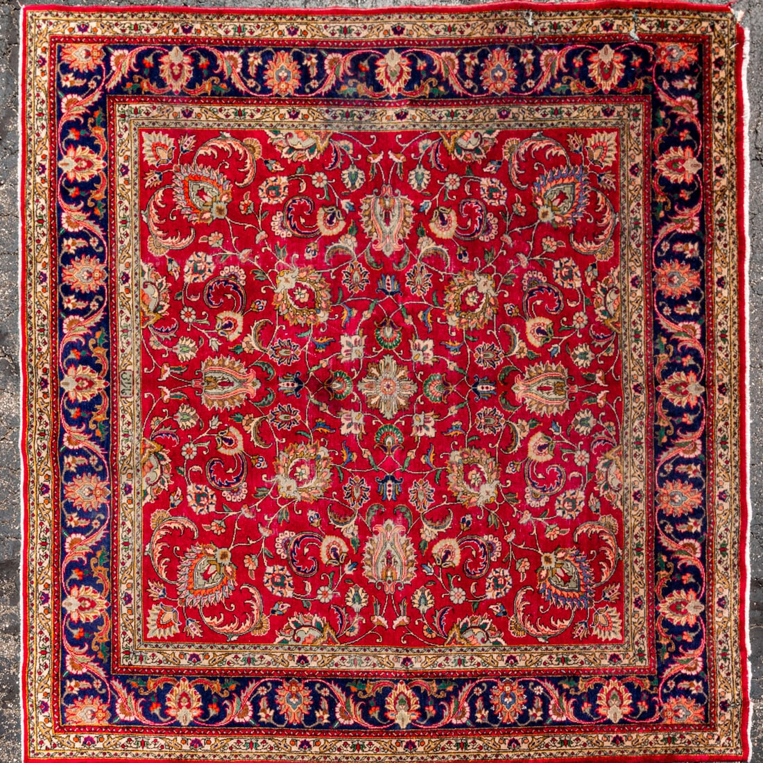 Persian Wool Rug: A Persian Wool Rug, Marked Antique. Made in Iran Dimensions: 9 ft. 9 in. x 9 ft. 11 in.