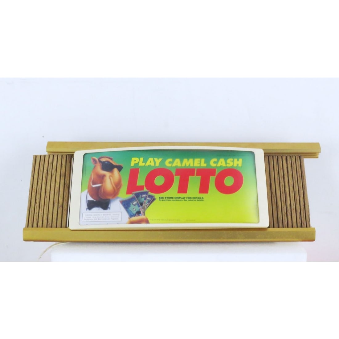Vintage Joe Camel Play Camel Cash Lotto Illuminated Advertising Sign: A Vintage Joe Camel Play Camel Cash Lotto Illuminated Advertising Sign, In working order. H: 11 W: 30 D: 9 in.