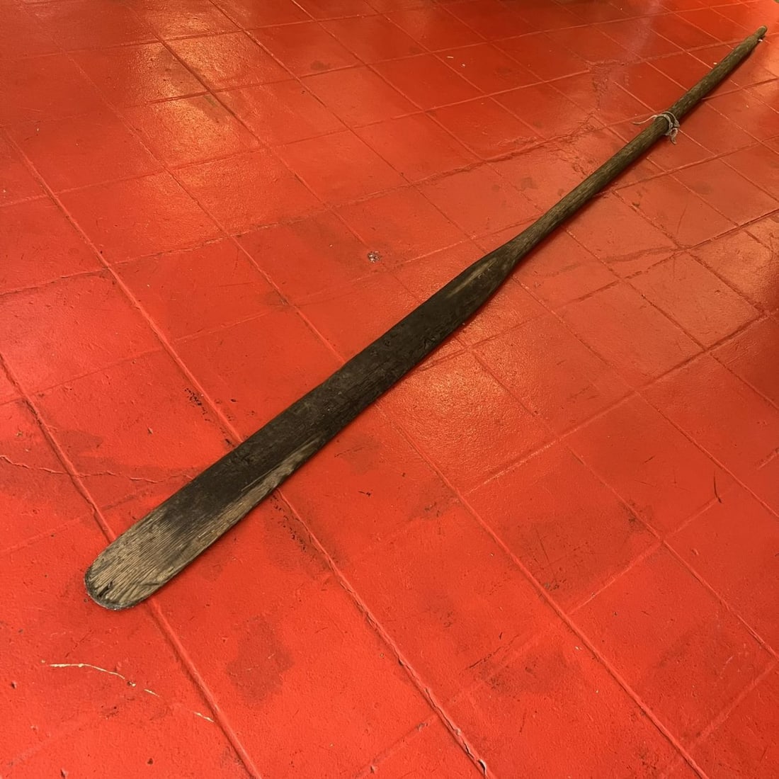 A Hand Carved Whale Boat Oar: An Extra Long Hand Carved Pine Whale Boat Oar, 19th Century, From a rescue rowing boat. Dimensions: L: 13 ft. Largest width: 4 1/2 in.