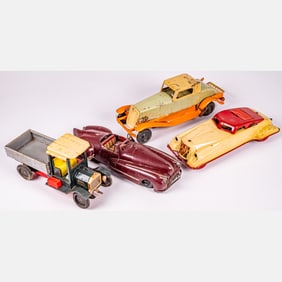 Four Antique Vehicle Toys