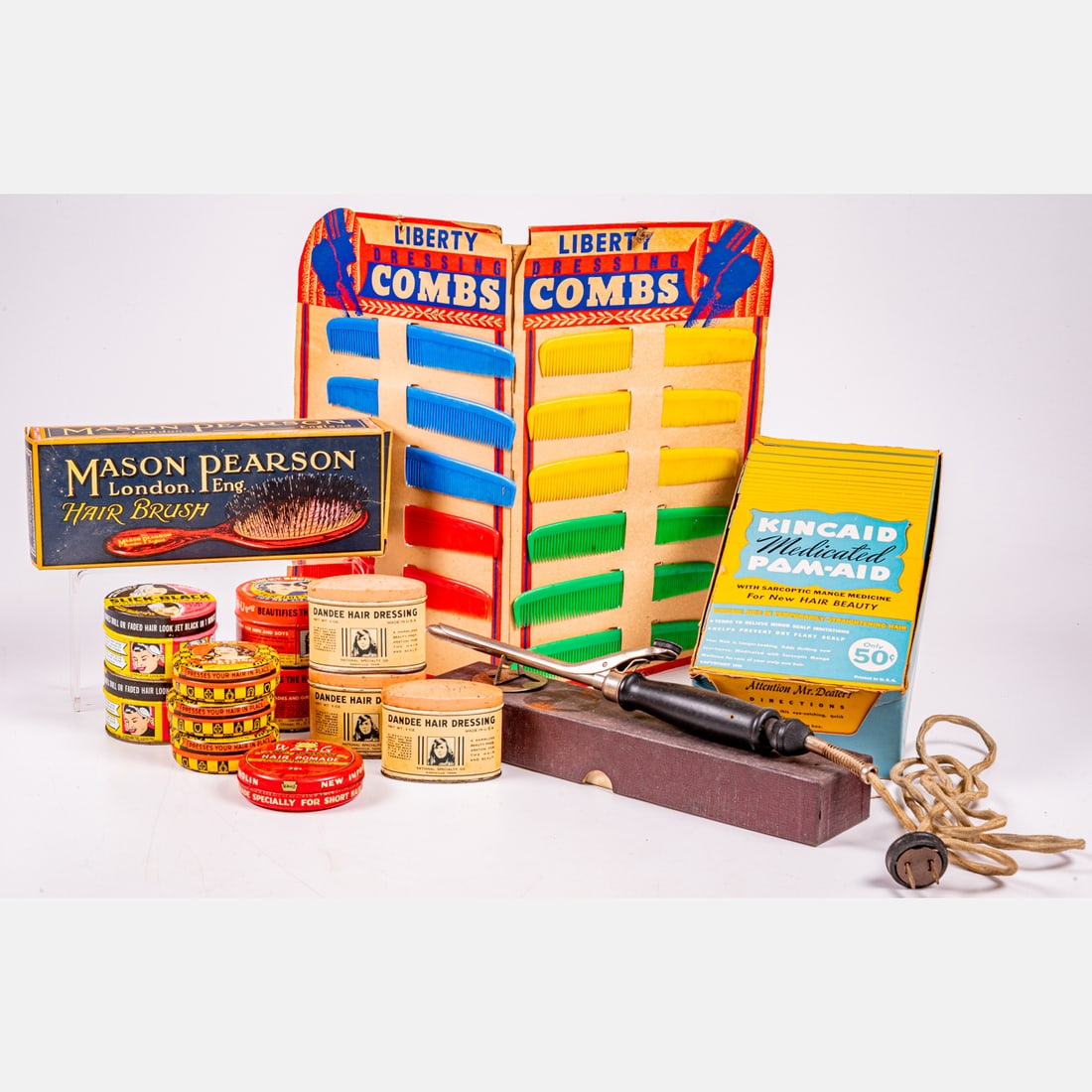 Barbershop Products And Tools: Collection Of Barbershop Products And Tools, Mid 20th Century, One wooden bristle Mason Pearson Hair Brush inside a box advertising a boar bristle brush. One electric curling iron, not tested. One cou