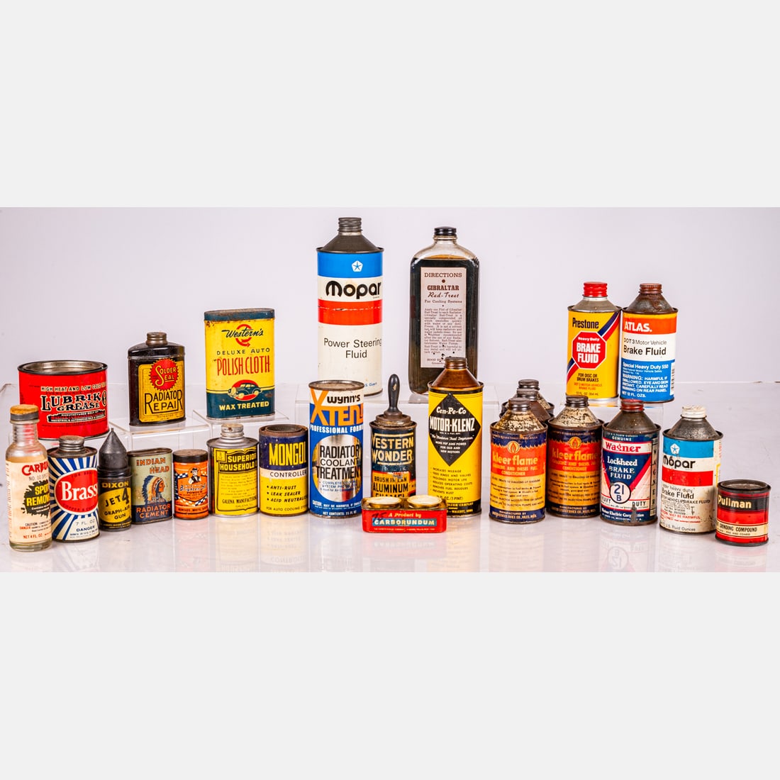 Lubricants, Fluids, Cleaners: Collection Of Lubricants, Fluids, Cleaners, Early To Mid 20th Century, One can of Lubriko grease, with product. One tin of Western’s Deluxe Auto Polish Cloth, with product. One tin of Solder Seal Ra