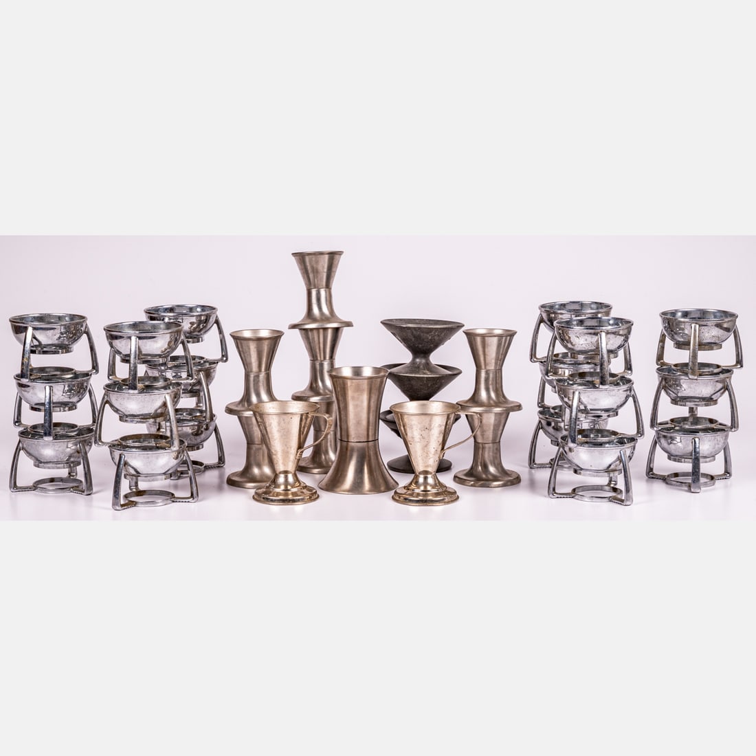 Collection Of Vintage Chromed Metal And Resin Ice Cream Cup Holders: Collection Of Vintage Chromed Metal And Resin Ice Cream Cup Holders, Early To Mid 20th Century, By various makers. Including V-Cups, Lily Tulip Cups, PC Cups. Tallest dimensions: H: 3 3/4 x W: 3 1/4 i