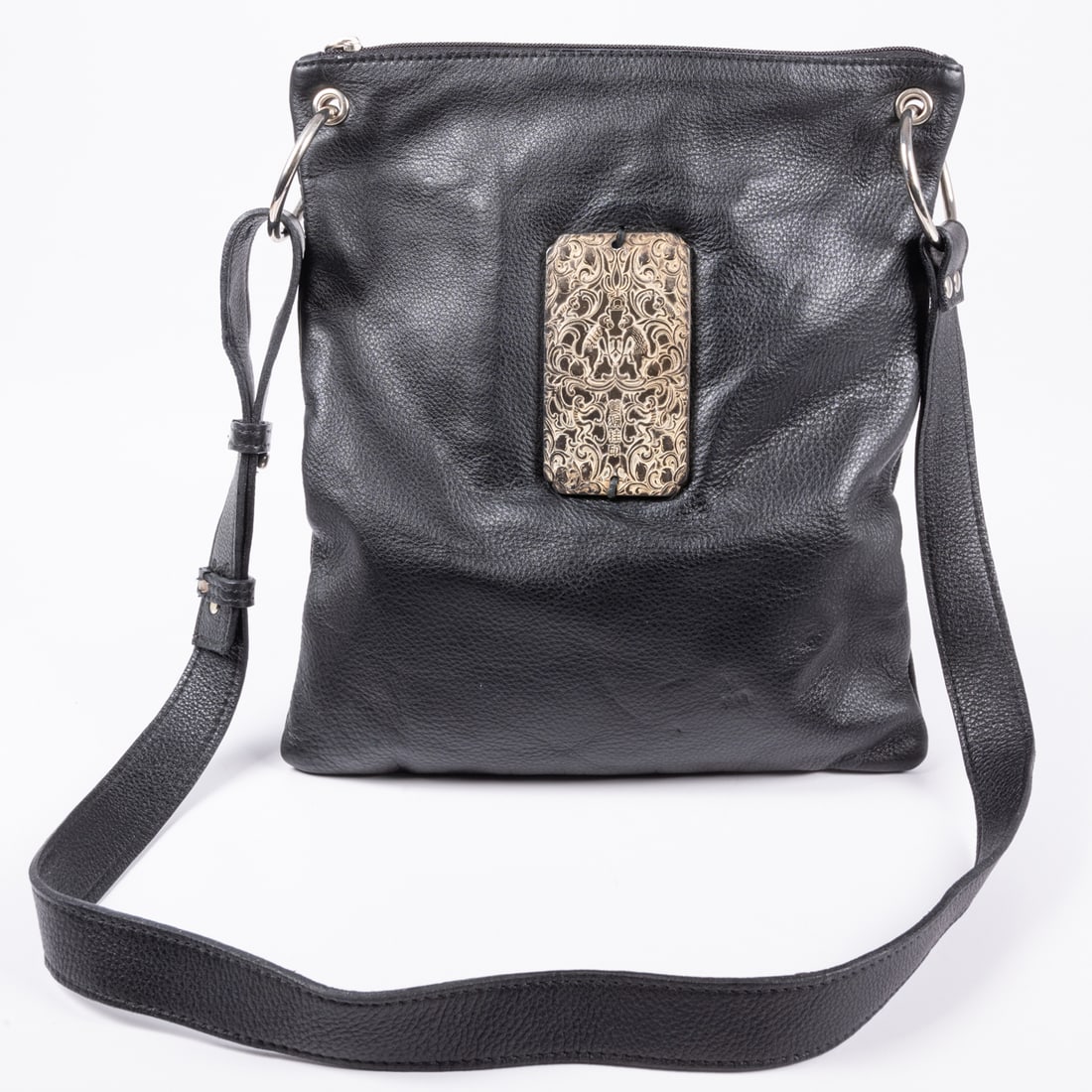 Black Pebbled Leather Shoulder Bag: Black Pebbled Leather Shoulder Bag With metal plaque ornamented with monkeys and Chinese script. Maroon fabric lining with one zip pocket and one leather pouch pocket. Measures H: 12 1/4 x W: 10 1/4 x