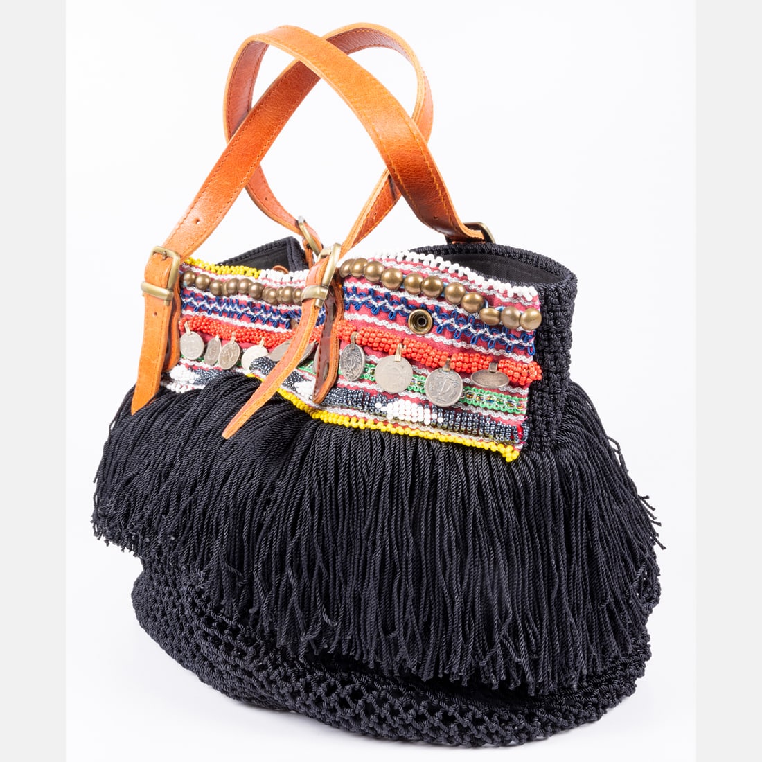 Elliot Mann Handbag: An Elliot Mann Woven And Beaded Handbag, Woven, beaded, leather and cotton handbag by Elliot Mann. Decorated with vintage coins and fabric fringe. Snap closure. Interior patch pocket and interior zip