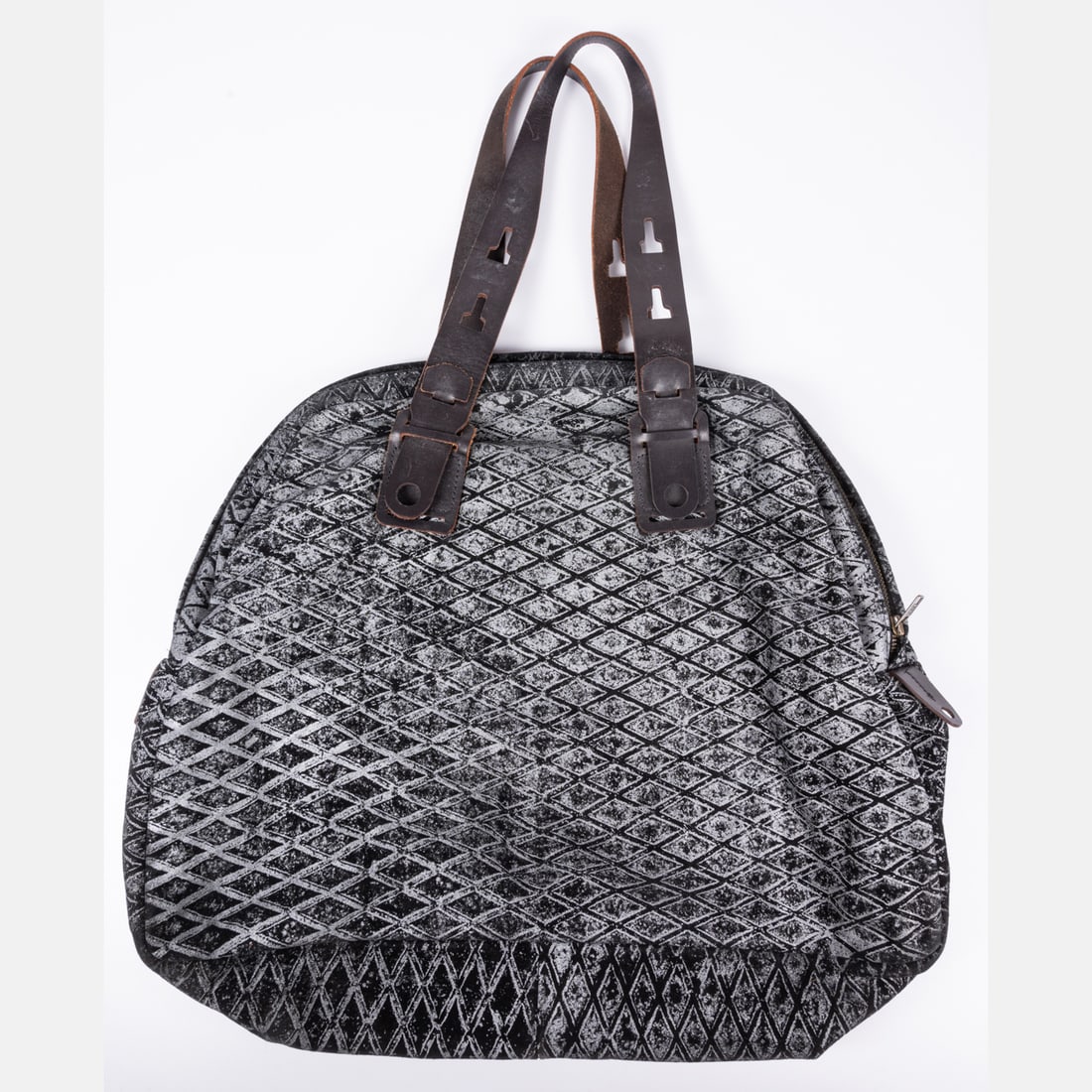Salvor by Ross Menuez Bag: A Salvor by Ross Menuez Cloth And Leather Bag, Exterior has diamond printed fabric with slightly velveteen texture. Interior striped cotton lining with one interior zip pocket. Zippered opening. Leath