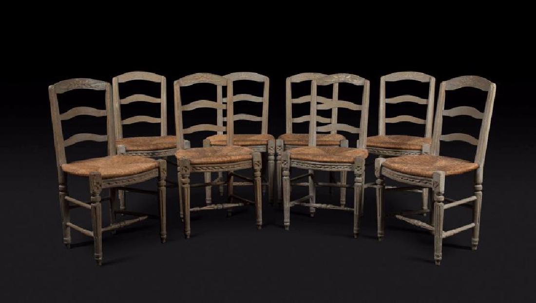 Neuf chaises peintes provençales, à assise paillée et: Neuf chaises peintes provençales, à assise paillée et dossier à bandeau et pieds fuselés à cannelures rudentées. Début du XIXème siècle. H : 89 cm, L : 48 cm. A set of 9 painted chairs H.: 3