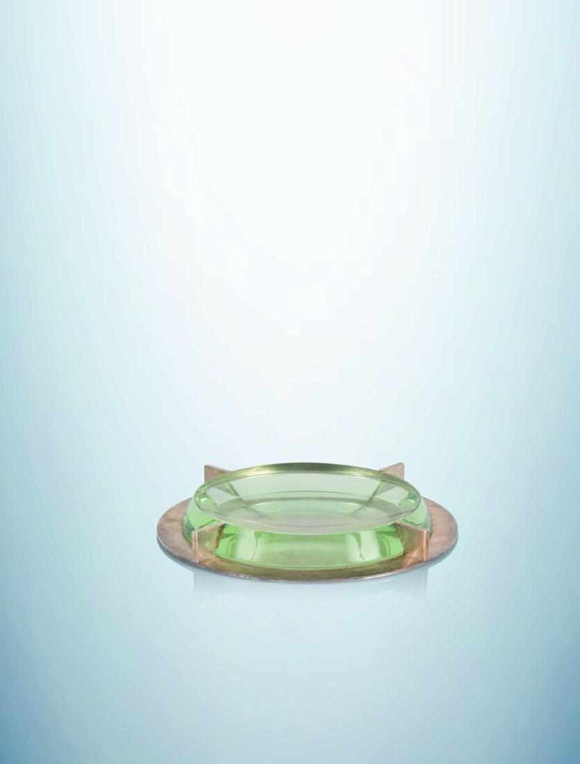 JEAN-BORIS LACROIX (1902-1984) Vide poche en epaisse: JEAN-BORIS LACROIX (1902-1984)Vide poche en epaisse dalle de verre concave encha?ssee dans une monture en metal nickele a quatre accroches de fixation sur une base circulaire en debordement.Signe du c