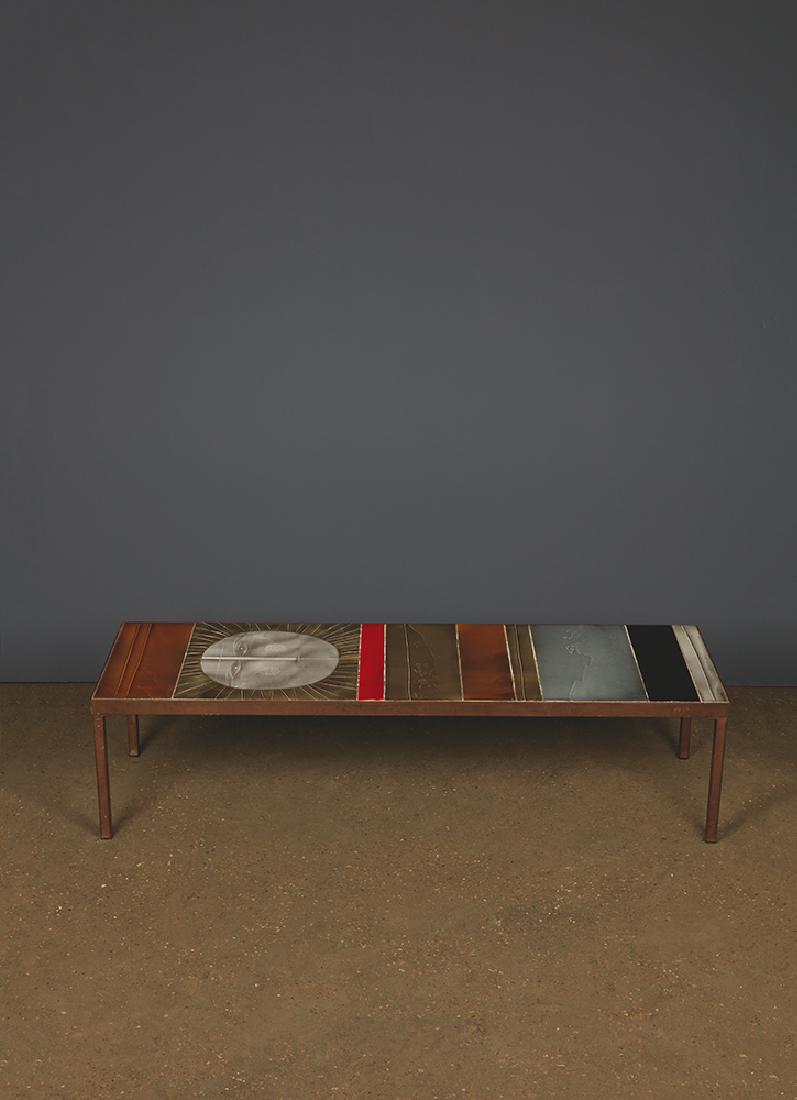 ROGER CAPRON (1922-2006) Soleil Table basse Ce?ramique: ROGER CAPRON (1922-2006) Soleil Table basse Ce?ramique et me?tal Date de cre?ation : 1959 H 31 x L 121 x P 41 cm Coffee table Ceramic and metal 12,2x 47,6 x 16,1