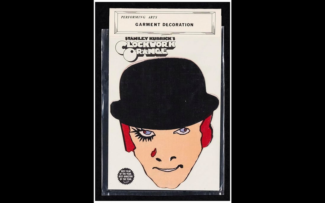 A CLOCKWORK ORANGE - Iron-On Color Fast Garment Decoration (9" x 5.5"); Near Mint: A CLOCKWORK ORANGE Iron-On Color Fast Garment Decoration (9" x 5.5") Near Mint; Artwork by Duggie Fields Warner Bros., 1971 This is an original iron-on transfer create