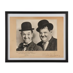 LAUREL AND HARDY - Stan Laurel and Oliver Hardy Autographed Oversize Photograph