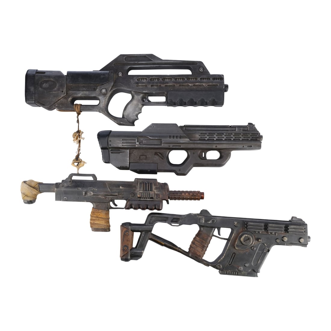 REBEL MOON - PART ONE: A CHILD OF FIRE (2023)/REBEL MOON - PART TWO: THE SCARGIVER (2024) - Zack: REBEL MOON - PART ONE: A CHILD OF FIRE (2023)/REBEL MOON - PART TWO: THE SCARGIVER (2024) - Zack Snyder Collection: Set of Four Bloodaxe Rebel Guns - A set of four Bloodaxe rebel guns from Zack Snyder