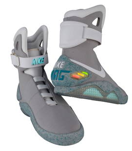 BACK TO THE FUTURE PART II (1989) - Official Licensed (2011) Light-Up Size 8 Marty McFly (Michael J.: BACK TO THE FUTURE PART II (1989) - Official Licensed (2011) Light-Up Size 8 Marty McFly (Michael J. Fox) Nike MAG Shoes - A pair of official licensed light-up Size 8 Marty McFly (Michael J. Fox) Nike