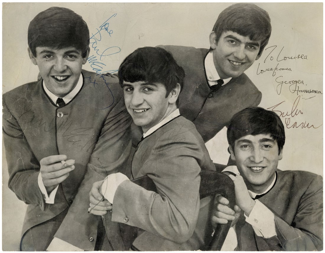 THE BEATLES - Dezo Hoffman Photo Autographed by John Lennon, Paul McCartney, George Harrison and: THE BEATLES - Dezo Hoffman Photo Autographed by John Lennon, Paul McCartney, George Harrison and Ringo Starr - A Dezo Hoffman photo autographed by all four members of The Beatles. Hoffman was a prolif