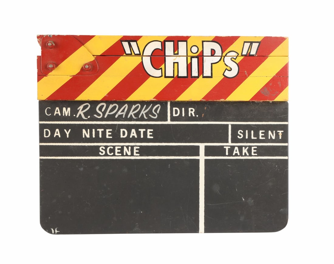 CHIPS (1977-1983) - Clapperboard: CHIPS (1977-1983) - Clapperboard - A clapperboard from the production of the crime drama television series CHiPs. The name of cinematographer, Robert F. Sparks, is hand-painted on the slate. The clapp