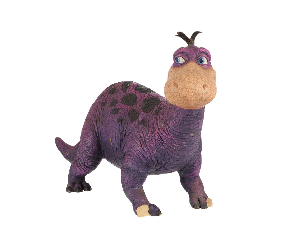 THE FLINTSTONES (1994) - Dino Maquette: THE FLINTSTONES (1994) - Dino Maquette - A Dino maquette from the production of Brian Levant's family comedy film The Flintstones. Dino was Fred (John Goodman) and Wilma Flintstone's (Elizabeth Perkin