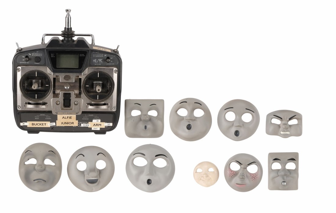 THOMAS & FRIENDS (T.V. SERIES, 1984-2008) - Nine Model Faces and Alfie Remote: THOMAS & FRIENDS (T.V. SERIES, 1984-2008) - Nine Model Faces and Alfie Remote - Nine model faces and an Alfie remote from the British children's television series Thomas & Friends. Each character had