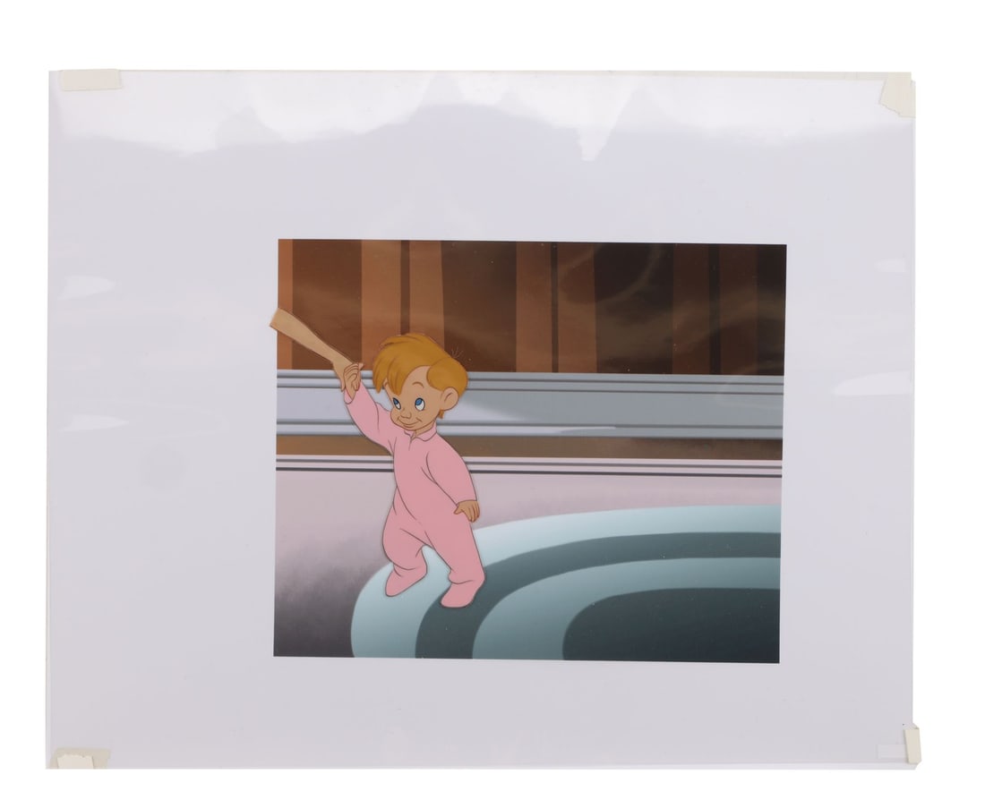 PETER PAN (1953) - Michael Darling Original Production Cel: PETER PAN (1953) - Michael Darling Original Production Cel - An original production cel featuring Michael Darling from Peter Pan (1953), presented on a printed presentation background. Released in 195