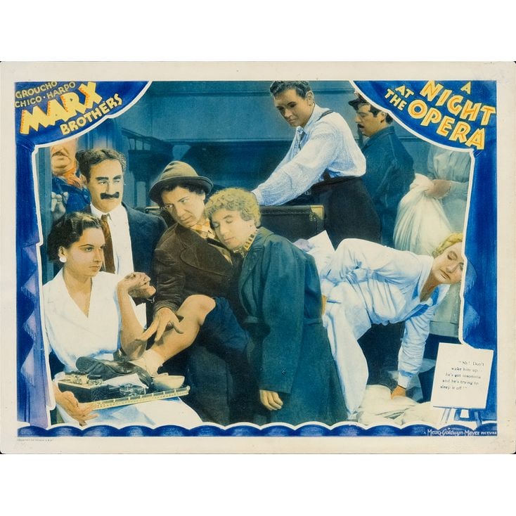 A NIGHT AT THE OPERA - Lobby Card (11" x 14"); Stateroom Scene; Fine-: A NIGHT AT THE OPERA Lobby Card (11" x 14"); Stateroom Scene ; Fine- MGM, 1935 Featuring all three Marx. Brothers, this "Stateroom Scene" card is widely regarded by c