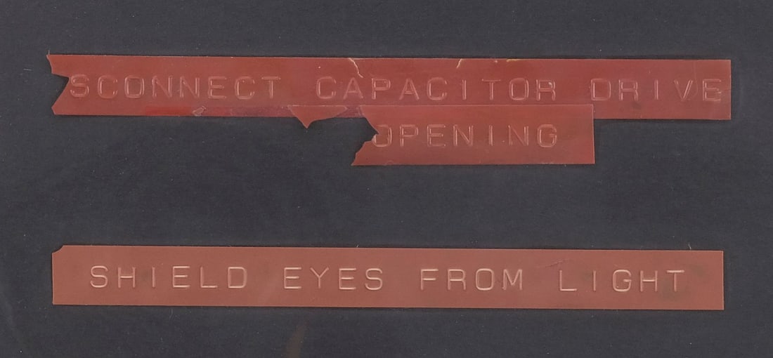 BACK TO THE FUTURE TRILOGY (1985-1990) - Framed Set of Three "A" (Hero) Car DeLorean Time Machine: BACK TO THE FUTURE TRILOGY (1985-1990) - Framed Set of Three "A" (Hero) Car DeLorean Time Machine Flux Capacitor Labels - Framed set of three "A" (hero) car DeLorean Time Machine flux capacitor