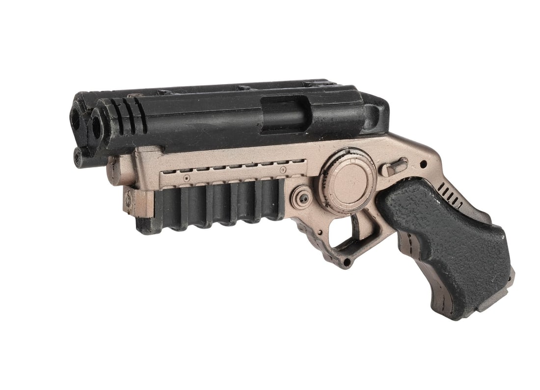 BATMAN BEGINS (2005) - Batman's (Christian Bale) Stunt Grapple Gun: BATMAN BEGINS (2005) - Batman's (Christian Bale) Stunt Grapple Gun - Batman's (Christian Bale) stunt grapple gun from Christopher Nolan's Batman Begins. Batman used his grapple gun - a creation of Way