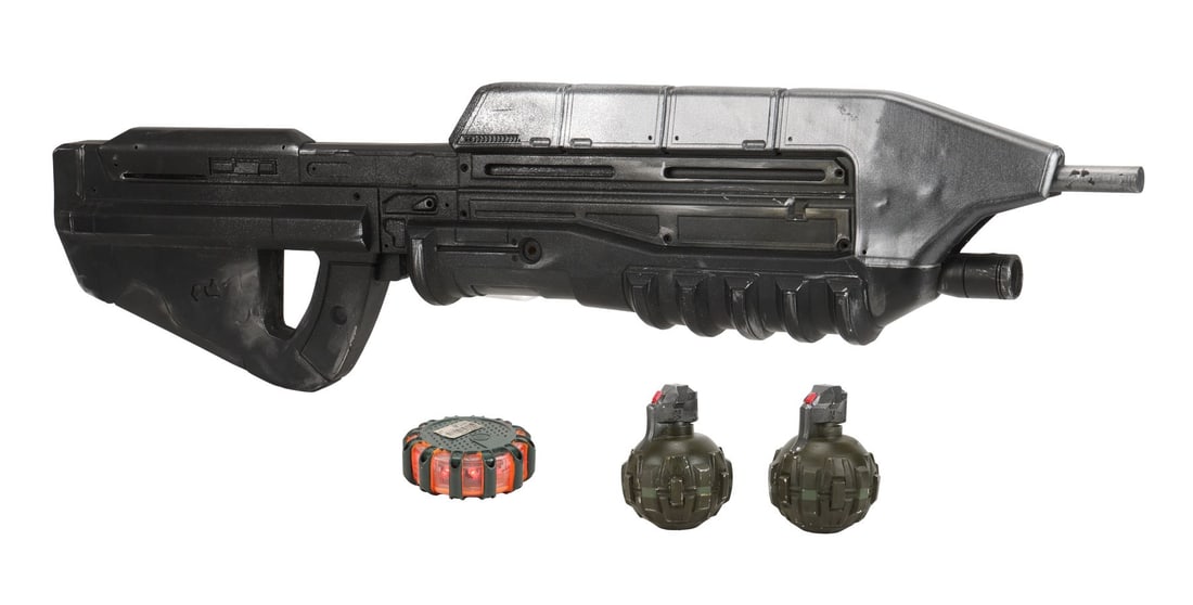 HALO (T.V. SERIES, 2022-PRESENT) - MA5C Assault Rifle and Grenades: HALO (T.V. SERIES, 2022-PRESENT) - MA5C Assault Rifle and Grenades - A MA5C assault rifle, grenades, and a mine from the sci-fi television series Halo. MA5C rifles were standard-issue service rifles
