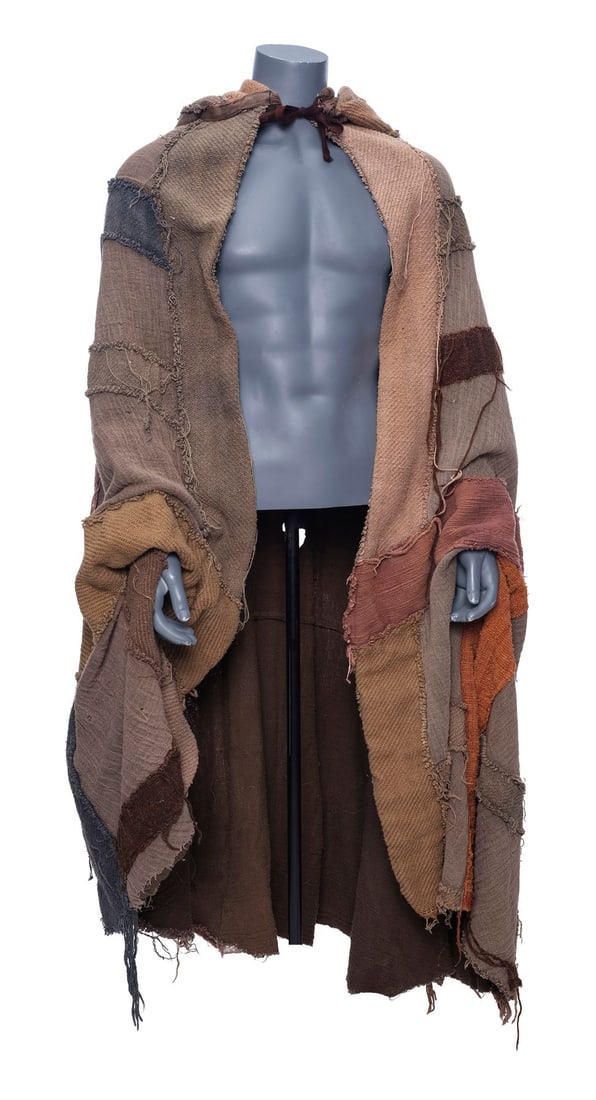 ROBIN HOOD: PRINCE OF THIEVES (1991) - Robin Hood's (Kevin Costner) Screen-Matched Cloak: ROBIN HOOD: PRINCE OF THIEVES (1991) - Robin Hood's (Kevin Costner) Screen-Matched Cloak - Robin Hood's (Kevin Costner) screen-matched cloak from Kevin Reynolds' Robin Hood: Prince of Thieves. Robin o