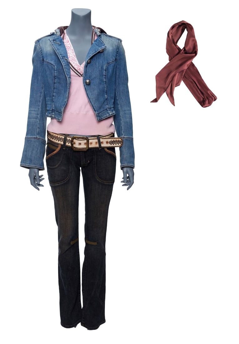 TRANSFORMERS (2007) - Mikaela Banes' Signature Ensemble: TRANSFORMERS (2007) - Mikaela Banes' Signature Ensemble - Mikaela Banes' signature ensemble from Paramount Pictures' Transformers. Mikaela first wore her signature ensemble when Sam Witwicky crashed