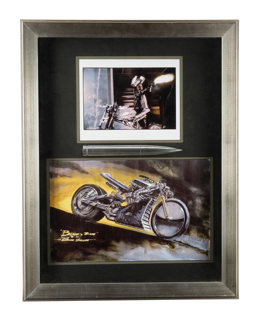 BLADE (1998) - Blade's (Wesley Snipes) Stake with Concept Art on Display: BLADE (1998) - Blade's (Wesley Snipes) Stake with Concept Art on Display - Blade's (Wesley Snipes) stake with concept art on display from Stephen Norrington's Blade. Half-vampire "Daywalker" Blade