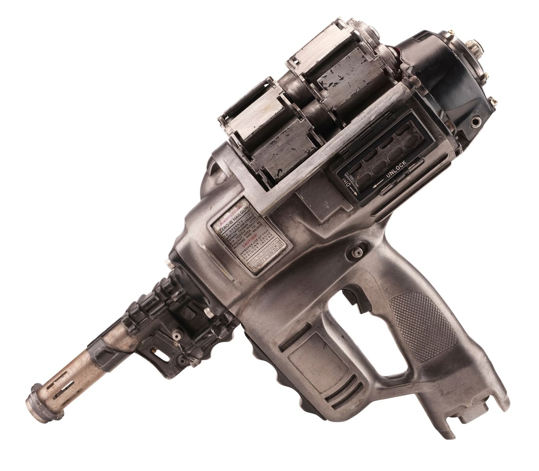 EVENT HORIZON (1997) - Light-Up Functional Nail Gun with Two Nail Bolts: EVENT HORIZON (1997) - Light-Up Functional Nail Gun with Two Nail Bolts - A light-up, functional nail gun with two nail bolts from Paul W.S. Anderson's Event Horizon. After the Lewis and Clark ship